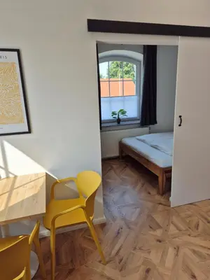 Ein Bett oder Betten in einem Zimmer der Unterkunft 2-Zimmer Wohnung 3 - Apartments am Schloss