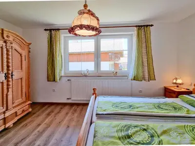 Ein Bett oder Betten in einem Zimmer der Unterkunft Oachkatzl