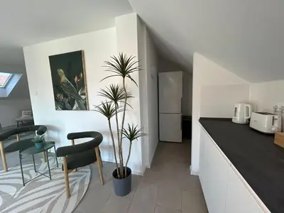Ein Sitzbereich in der Unterkunft Grand Suite - Perfekt für 6! Parken Flughafen