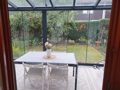 Ein Garten an der Unterkunft 80m2 ruhige 3 Zimmer Duplexwohnung mit zwei Bäder und schönem Garten