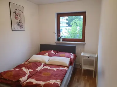 Ein Bett oder Betten in einem Zimmer der Unterkunft 80m2 ruhige 3 Zimmer Duplexwohnung mit zwei Bäder und schönem Garten