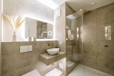 Ein Badezimmer in der Unterkunft Lindgold Apartments