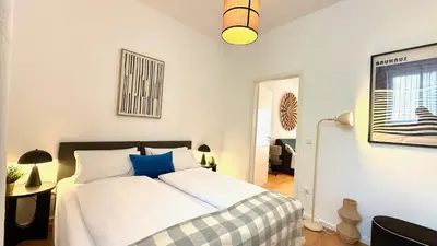 Ein Bett oder Betten in einem Zimmer der Unterkunft BeckHomes Munich - Stylish Central Apartments