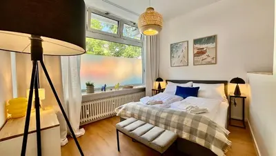 Ein Bett oder Betten in einem Zimmer der Unterkunft BeckHomes Munich - Stylish Central Apartments
