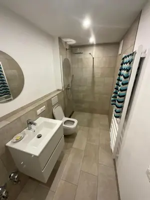 Ein Badezimmer in der Unterkunft Ferienwohnung in der Au