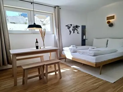 Ein Bett oder Betten in einem Zimmer der Unterkunft Ferienwohnung Bergufer - Studio im Souterrain