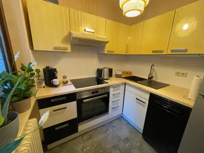 Küche/Küchenzeile in der Unterkunft Modern eingerichtete Ferienwohnung Traumtagerl ruhig, zentral, ideal für Familien & Paare