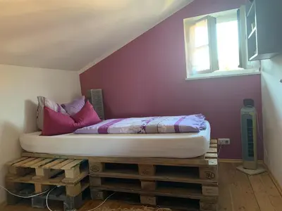 Ein Bett oder Betten in einem Zimmer der Unterkunft Seelenbaumlerin