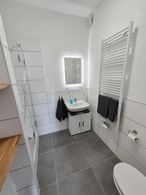 Ein Badezimmer in der Unterkunft 2-Zimmer Wohnung 4 - Apartments am Schloss