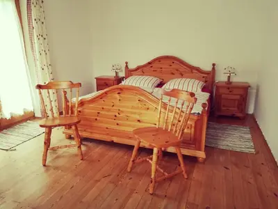 Ein Bett oder Betten in einem Zimmer der Unterkunft Ferienhaus Anni