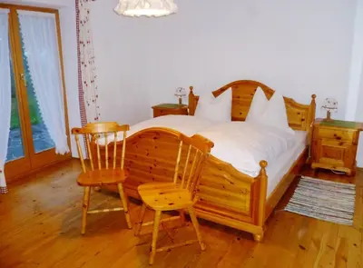 Ein Bett oder Betten in einem Zimmer der Unterkunft Ferienhaus Anni