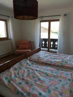 Ein Bett oder Betten in einem Zimmer der Unterkunft Ferienhaus Anni