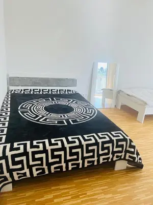 Ein Bett oder Betten in einem Zimmer der Unterkunft Light and Spicy