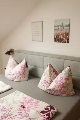Ein Bett oder Betten in einem Zimmer der Unterkunft Brunnlochnerhof