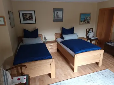 Ein Bett oder Betten in einem Zimmer der Unterkunft Ferienwohnung