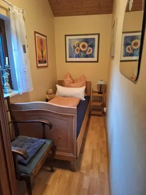 Ein Bett oder Betten in einem Zimmer der Unterkunft Ferienwohnung