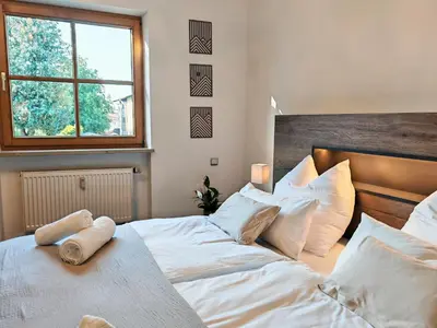 Ein Bett oder Betten in einem Zimmer der Unterkunft Berg-Feeling