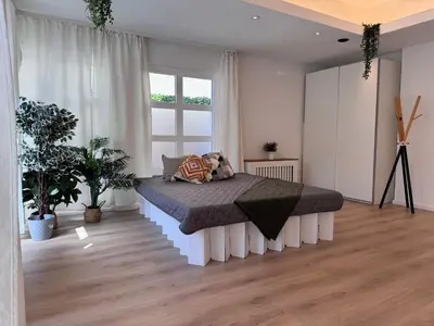 Ein Bett oder Betten in einem Zimmer der Unterkunft Studio direkt beim Oktoberfest