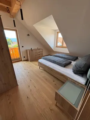 Ein Bett oder Betten in einem Zimmer der Unterkunft Ferienwohnung Abendrot Jochner