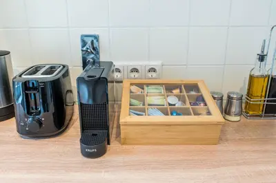 Kaffee-/Teezubehör in der Unterkunft Central Apartments Direkt am Königsplatz l Fußball-Tisch I perfekt für Familien & Freunde & Business