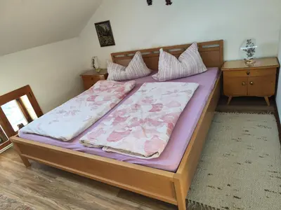 Ein Bett oder Betten in einem Zimmer der Unterkunft Hintergraber Hof
