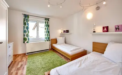 Ein Bett oder Betten in einem Zimmer der Unterkunft Apartment Sir George