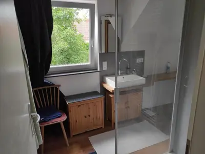 Ein Badezimmer in der Unterkunft Omas Häuschen am See