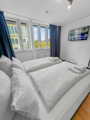 Ein Bett oder Betten in einem Zimmer der Unterkunft Flatista Homes - Herzog Heinrich