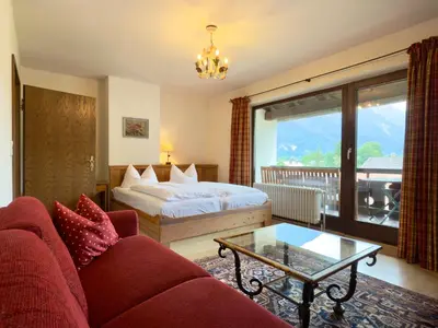 Ein Bett oder Betten in einem Zimmer der Unterkunft Hotel Forsthaus Oberau