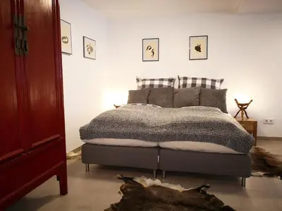 Ein Bett oder Betten in einem Zimmer der Unterkunft Weyarn südlich von München