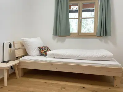 Ein Bett oder Betten in einem Zimmer der Unterkunft FeWo Rainerweber Bochseitn