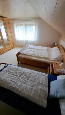 Ein Bett oder Betten in einem Zimmer der Unterkunft Familie Pöllet