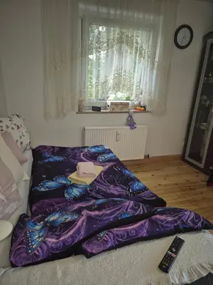 Ein Bett oder Betten in einem Zimmer der Unterkunft Zimmer