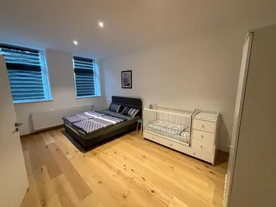Ein Bett oder Betten in einem Zimmer der Unterkunft Jenbachnest