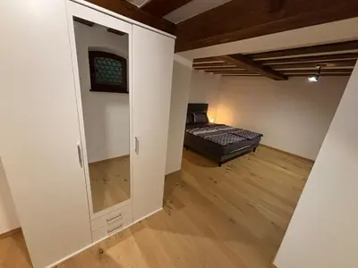 Ein Bett oder Betten in einem Zimmer der Unterkunft Jenbachnest