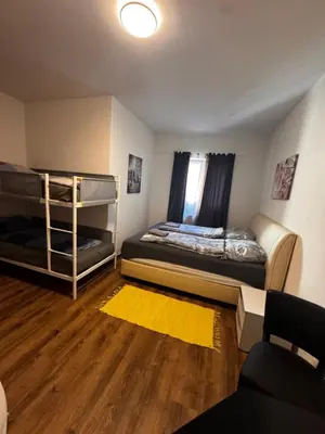 Ein Bett oder Betten in einem Zimmer der Unterkunft Aby