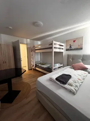 Ein Bett oder Betten in einem Zimmer der Unterkunft Aby
