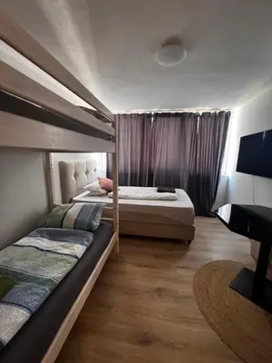 Ein Bett oder Betten in einem Zimmer der Unterkunft Aby