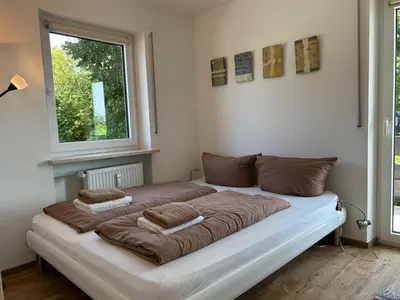 Ein Bett oder Betten in einem Zimmer der Unterkunft Fewo Uferglück
