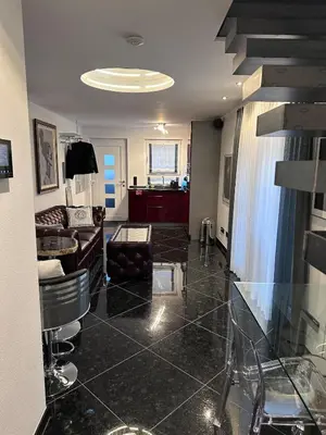 Ein Sitzbereich in der Unterkunft Luxus Garten Maisonette im Herz von Bad Wörishofen