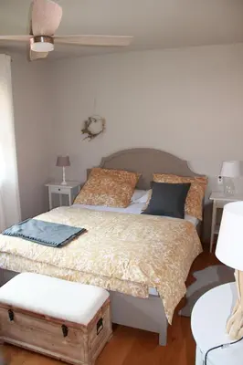 Ein Bett oder Betten in einem Zimmer der Unterkunft Ferienwohnung Oberammergau