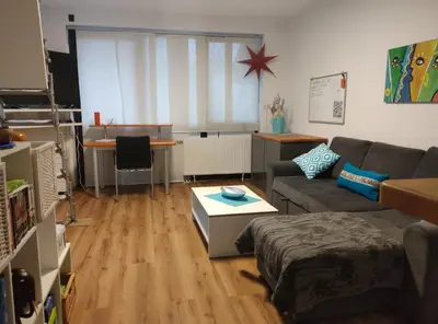 Ein Sitzbereich in der Unterkunft Mini-Haus mit Charme zwischen München und Chiemsee