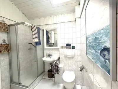 Ein Badezimmer in der Unterkunft Chiemsee Häuschen