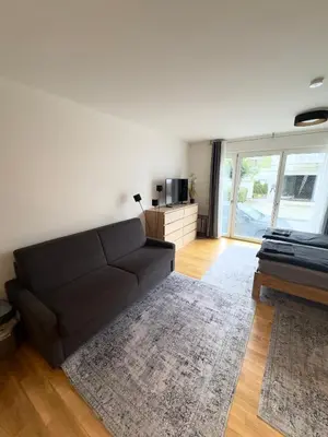 Ein Sitzbereich in der Unterkunft Modernes Apartment - Pasing Arcaden - S-Bahn
