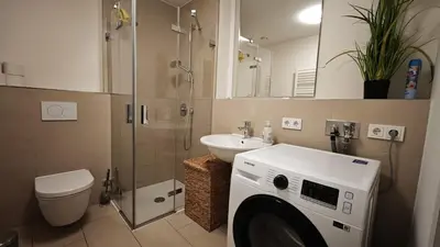 Ein Badezimmer in der Unterkunft Modernes Apartment - Pasing Arcaden - S-Bahn
