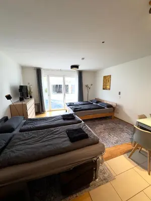 Ein Bett oder Betten in einem Zimmer der Unterkunft Modernes Apartment - Pasing Arcaden - S-Bahn