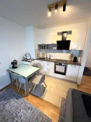 Küche/Küchenzeile in der Unterkunft Modernes Apartment - Pasing Arcaden - S-Bahn