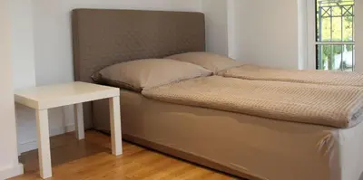 Ein Bett oder Betten in einem Zimmer der Unterkunft Nice and big Apartment for up to 10 people in a very good Location of Munich! Good for Oktoberfest!