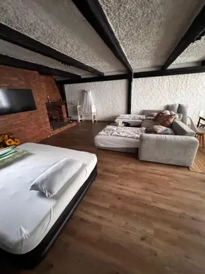 Ein Bett oder Betten in einem Zimmer der Unterkunft Aby Deluxe Wohnung