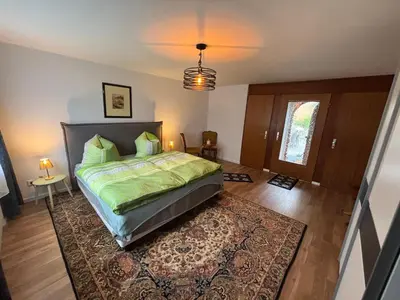 Ein Bett oder Betten in einem Zimmer der Unterkunft Kleine Bergzeit